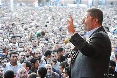 Egypt presidency: Morsi decrees 'temporary', wants talks