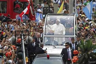 Huge crowds in Brazil welcome Pope Francis back to home continent