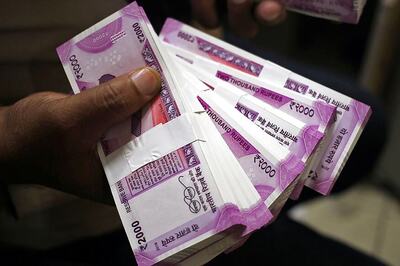 Rupee Drops 7 Paise Against Dollar In Early Trade