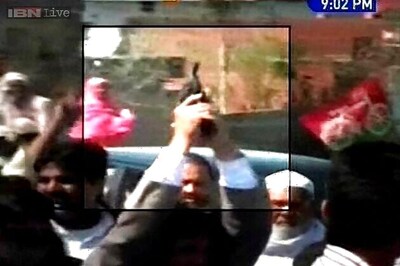 Photos: Samajwadi Party workers fire a gun, throw money in the air during Moradabad road show