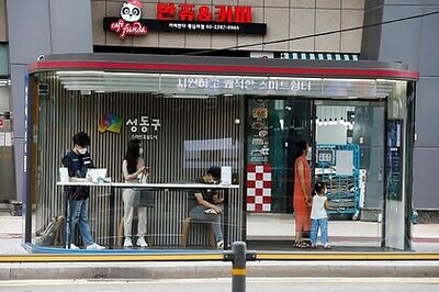Keeps out rain and COVID-19, Seoul tries smart bus shelter to fight virus
