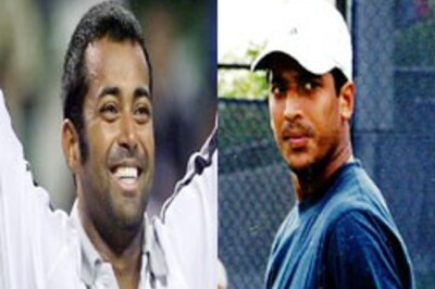 Paes advances, Bhupathi ousted