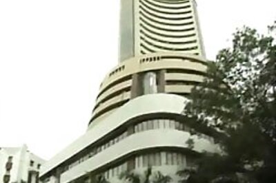 Sensex tests 11K; ICICI Bank jumps over 13%