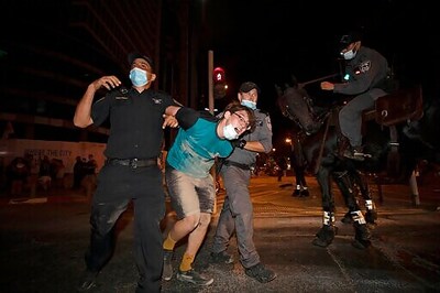 The Latest: India's COVID-19 Deaths Approach 100,000