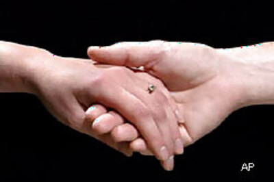 Bride walks down the aisle with a black eye