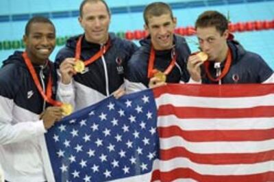 US relay thriller keeps Phelps's eight-gold dream alive