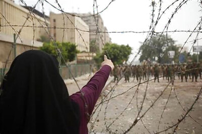 Egypt wins Arab billions, names prime minister