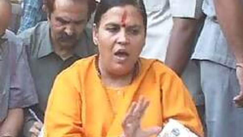 BJP mulls action, Uma gets saffron salute
