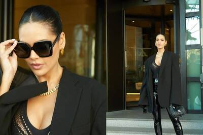 Esha Gupta Flaunts Her Bold Avatar In Black Netted Top And Leather Pants