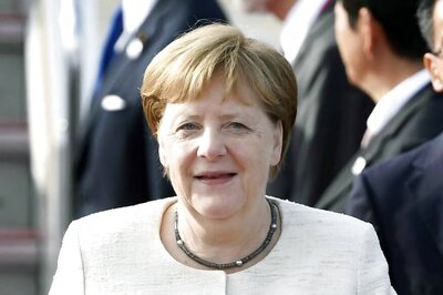 Angela Merkel, German Minister Share a Laugh as He Avoids Handshake over Coronavirus Fears