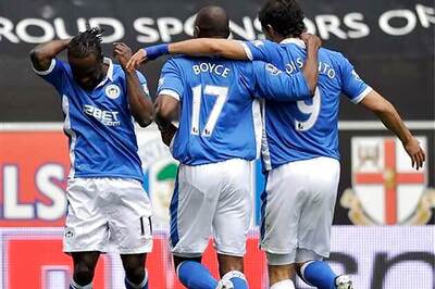 Wigan dent Newcastle top-four hopes