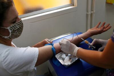 Millions of Covid-19 Vaccine Doses Remain Unused in US, Putting 2020 Goal in Doubt