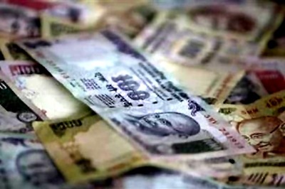 Rupee up 7 paise against dollar in early trade
