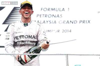 Lewis Hamilton wins Malaysian Grand Prix in Mercedes' 1-2 finish