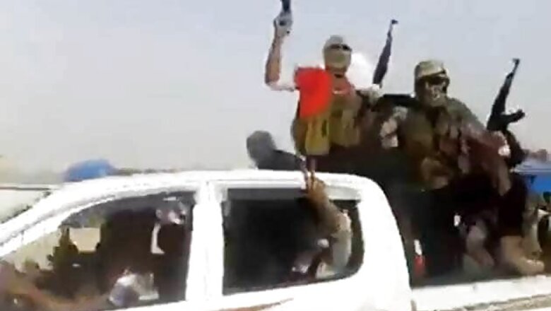 Iraq militants take Syria border post as they head to capital city of Baghdad