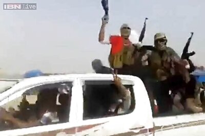 Iraq militants take Syria border post as they head to capital city of Baghdad