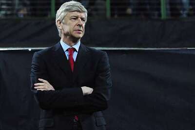 Wenger happy but says too early to talk of title