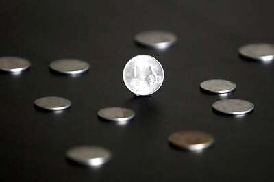 Rupee down 12 paise against dollar in early trade