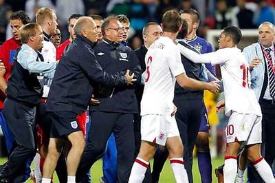 UEFA charges Serbia, England as police probe brawl