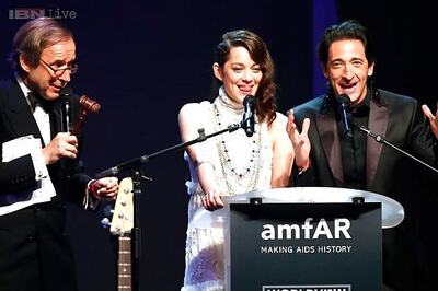 Cannes glitterati step up for AIDS charity gala