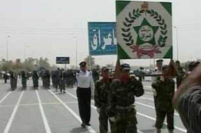 US troops withdraw Iraq towns, Iraqi forces takeover