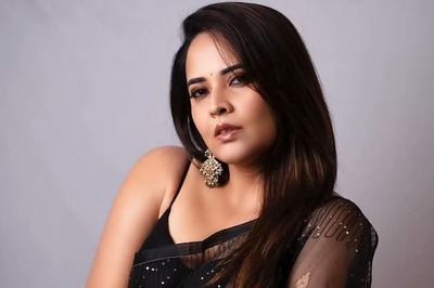 Anasuya Bharadwaj Oozes Oomph In A Black Netted Saree