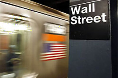 Wall Street giants dwarfed | Worldwide wreck | Bush says