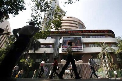 Sensex closes 63 points down on expiry day