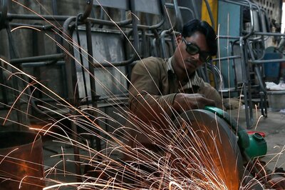 India's Factory Activity Grows at Slower Pace, PMI Manufacturing Falls to 54 in March