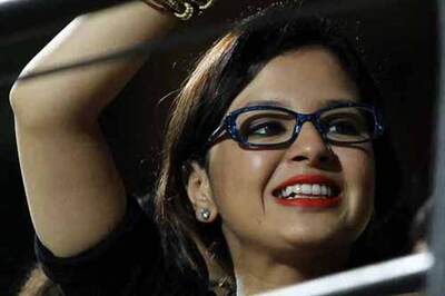 Snapshot: Sakshi Dhoni sports bold red lips and glasses at IPL match
