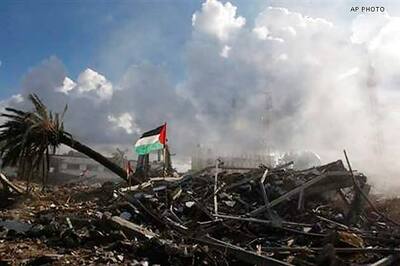 Israel bombards Gaza as it searches for soldier