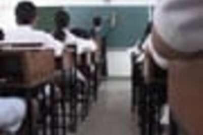 Teacher caught on cell phone caning students