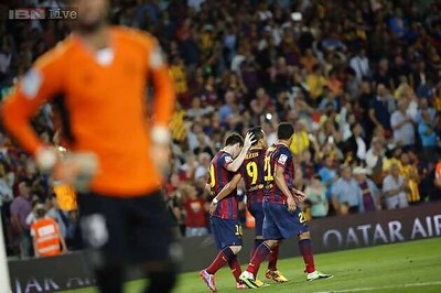 Alexis' late goal lifts Barcelona to 3-2 over Sevilla