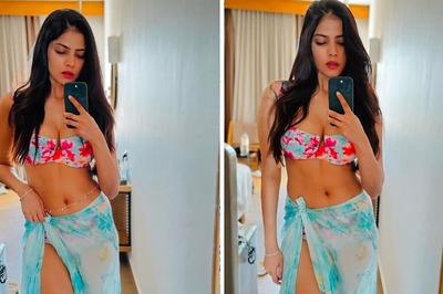 Actress Malavika Mohanan Oozes Oomph In Bikini And Sarong