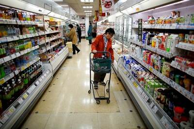 What's Essential in Coronavirus Crisis? Pastry & Wine in France, Golf & Guns in US