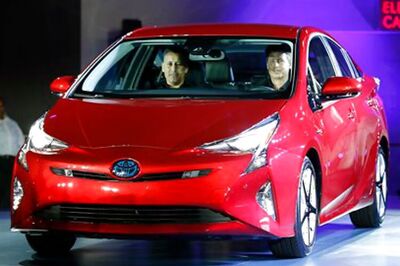 Toyota unveils sleeker, gas-powered 2016 Prius hybrid