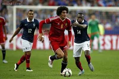 Marouane Fellaini nets double as Belgium humble France