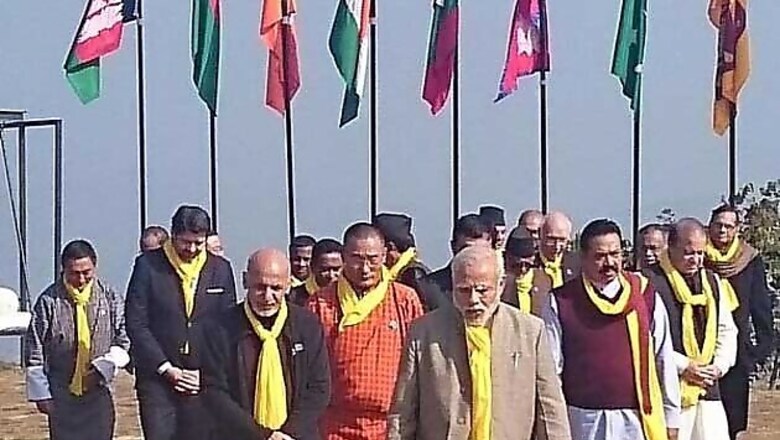 Modi, Sharif shake hands, meet at SAARC retreat
