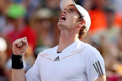 Andy Murray sweats to win at ATP finals round one