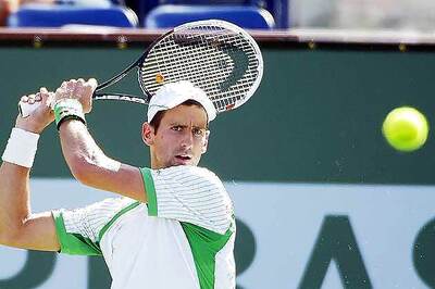 Djokovic races past Rosol into third round in Sony Open