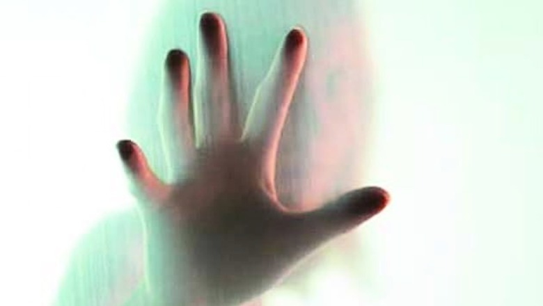 Teacher held for sexually assaulting school students