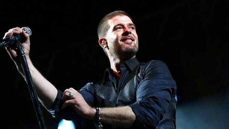 Robin Thicke buys Halloween gifts for girls