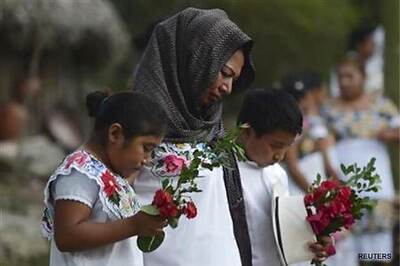 Maya 'end of days' dawns in Mexico, world lives on