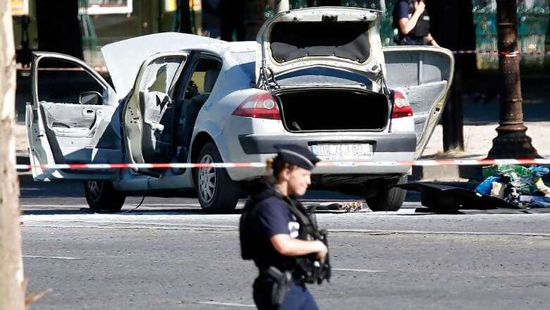 Champs Elysees attacker stashed weapons, was on French watchlist