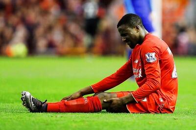 Liverpool's Divock Origi out for a month after knee surgery