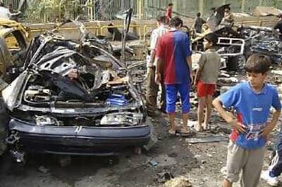 Baghdad bombs kill 132, govt slams neighbours