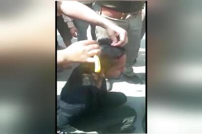 Policemen Suspended for Inaction Over Youth's Tonsuring