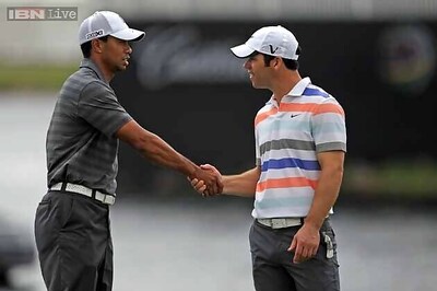 Woods six back as Casey shares lead in rainy Turkey