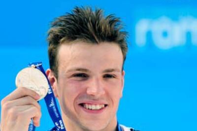 Biedermann crushes Phelps in world swimming championship