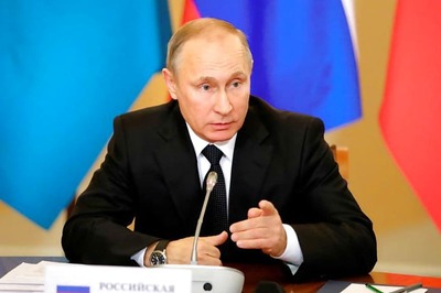 'Don't Worry, be Happy', Says Putin After Trump Ditches Paris Climate Accord